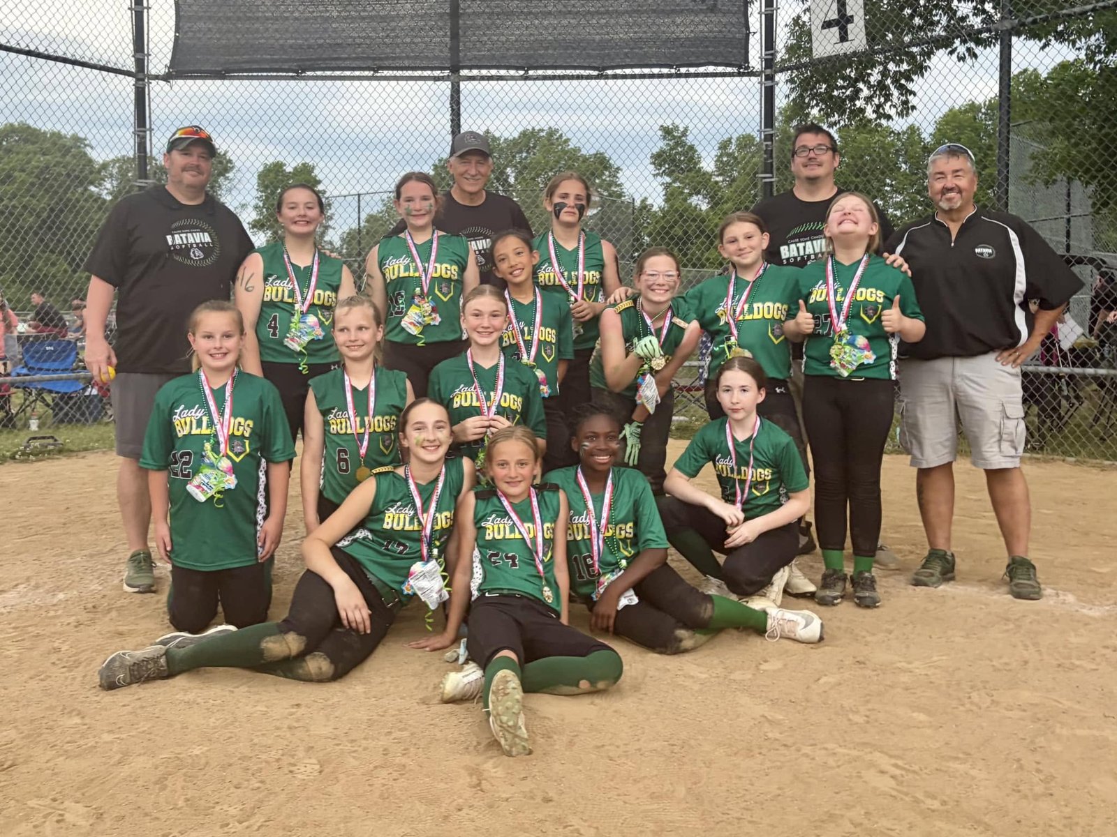 BCRL softball team with medals and coaches
